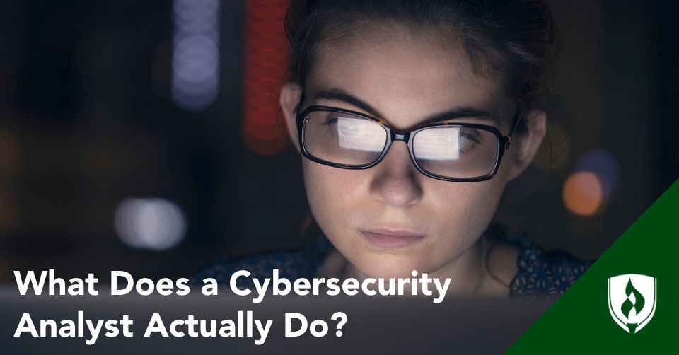 A cybersecurity analyst at their desk